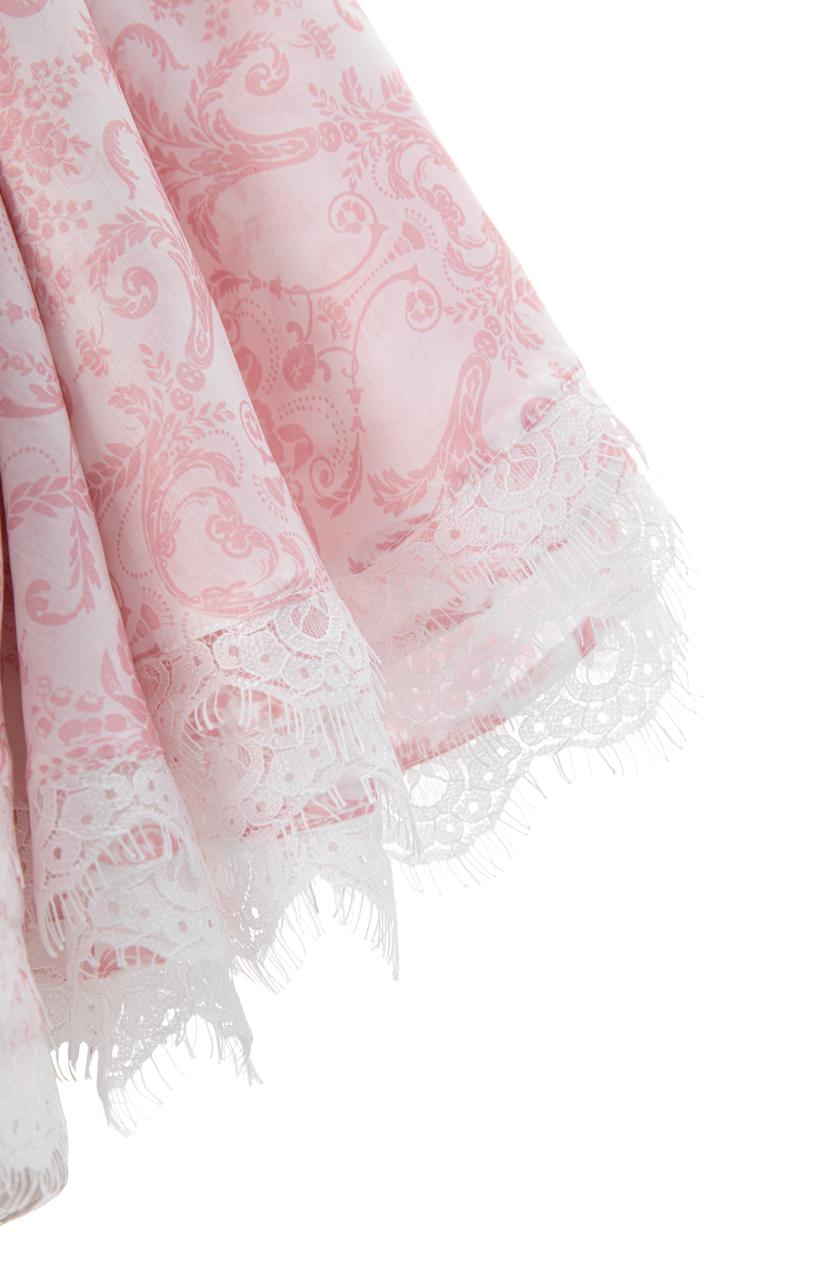 Close-up of printed organza corset fabric and lace