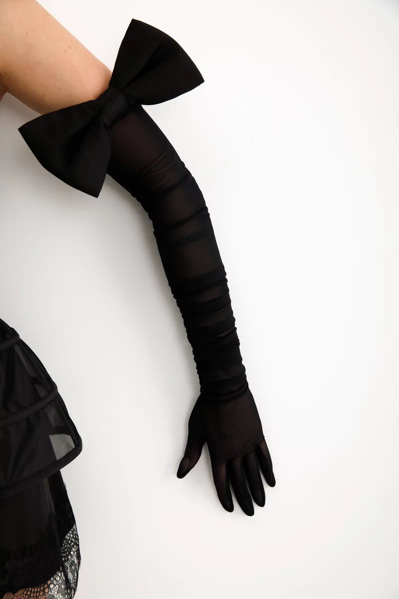Black stretch mesh glove, close-up showing sheer fingers fully covered to the fingertips