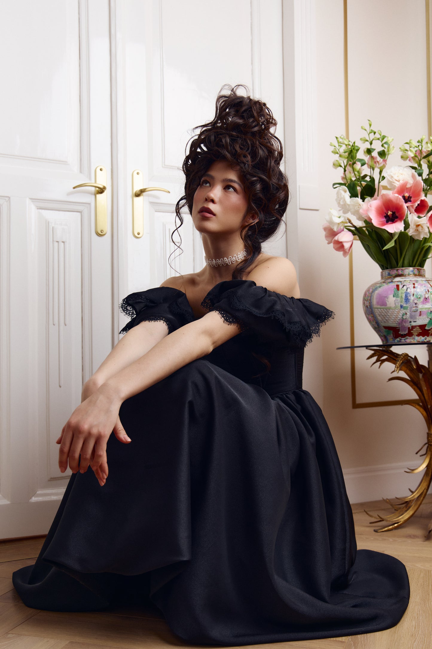 Black crepe chiffon gown with structured corset silhouette
