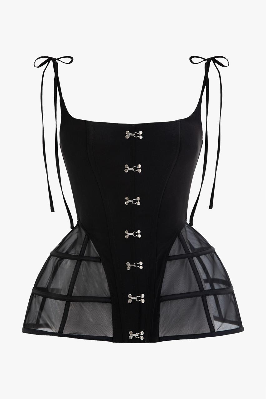 Close-up of front hook fastening on black satin corset