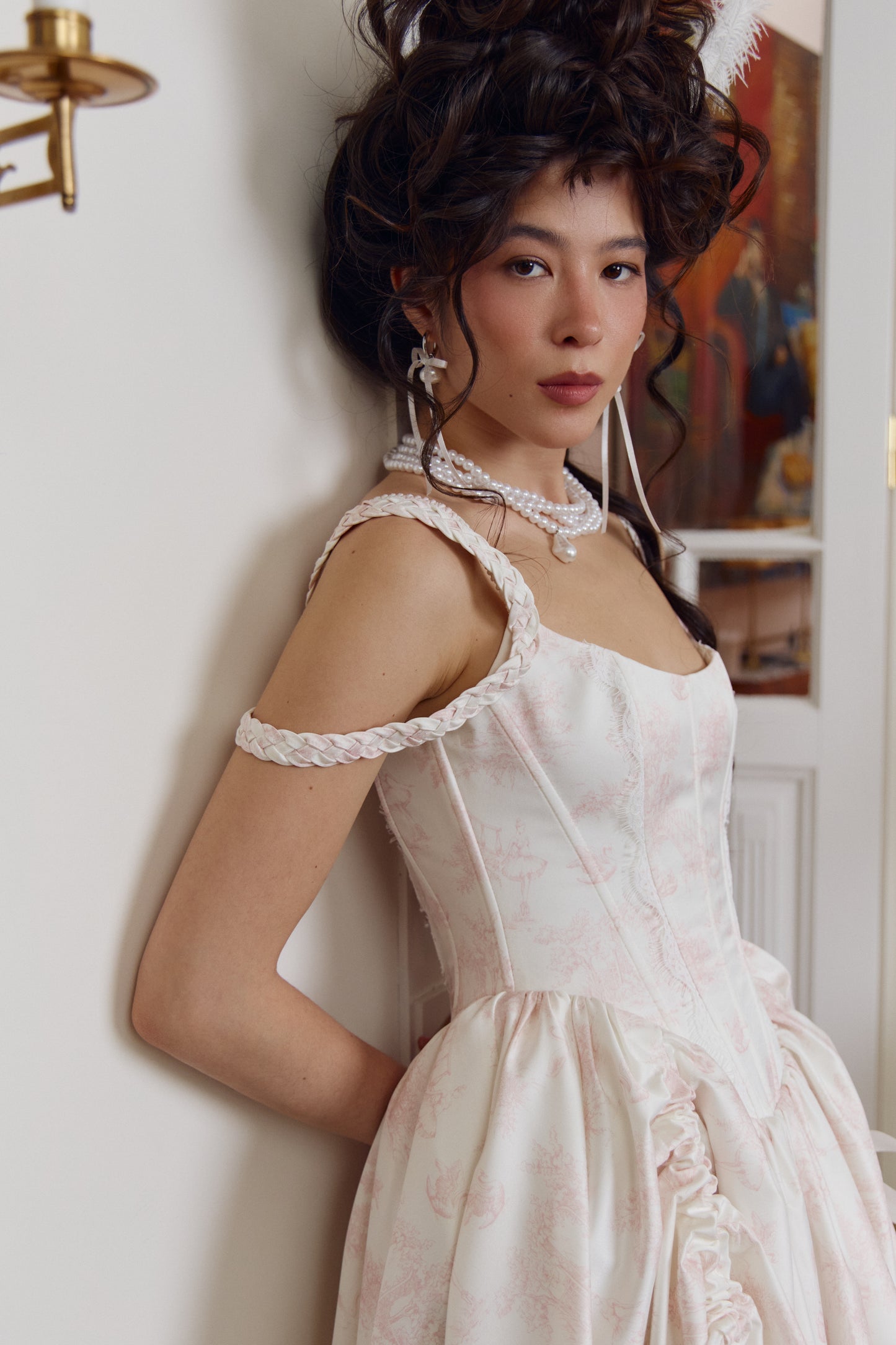 Romantic ivory satin dress with fitted silhouette