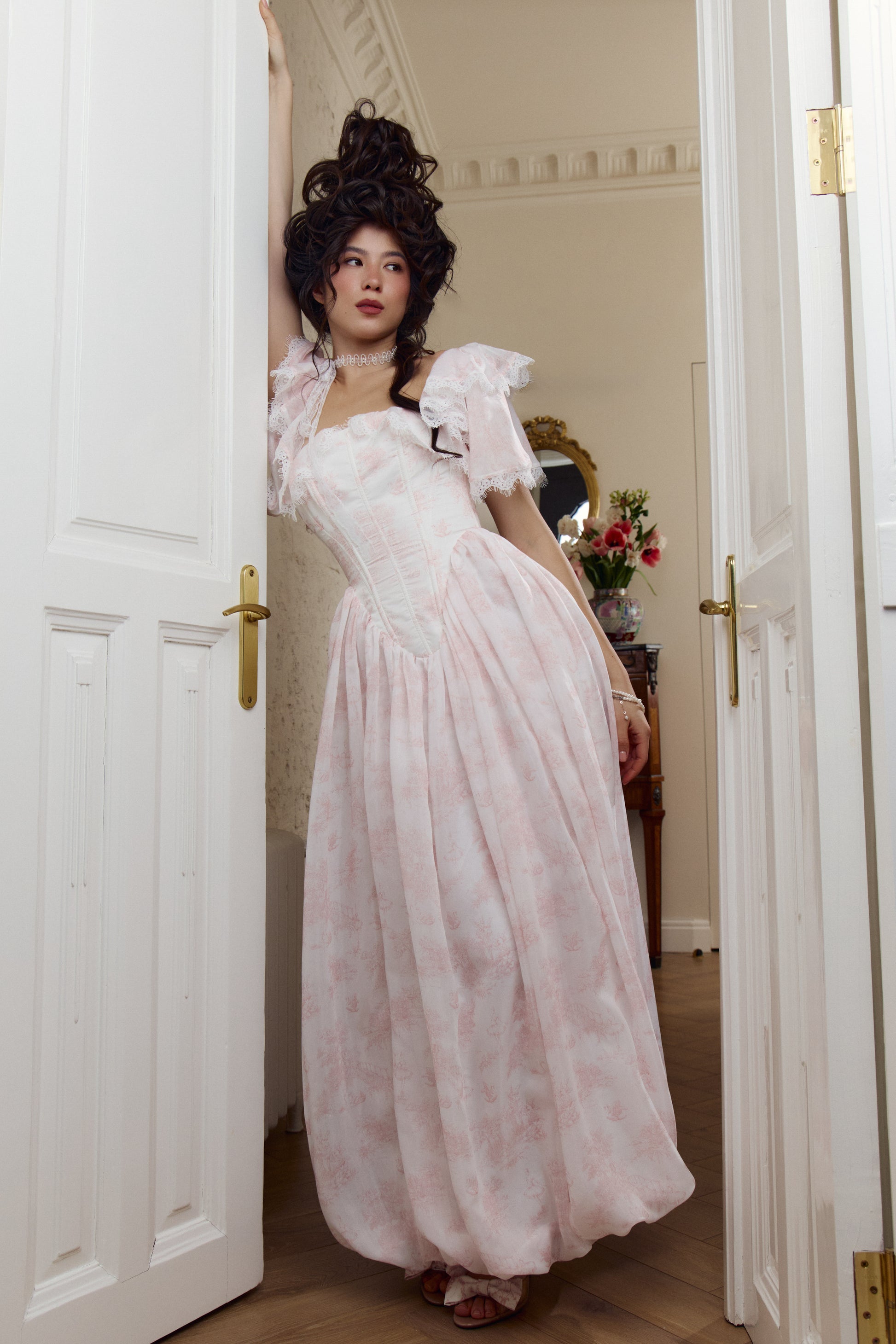 Ivory organza gown with structured corset silhouette