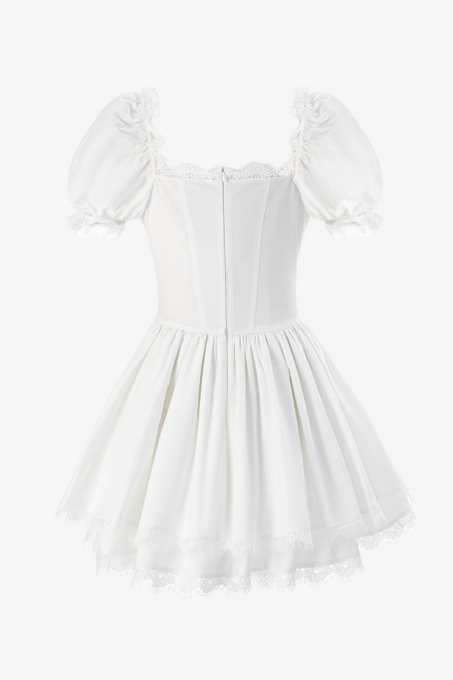 Lace trimmed white corset mini dress close up
