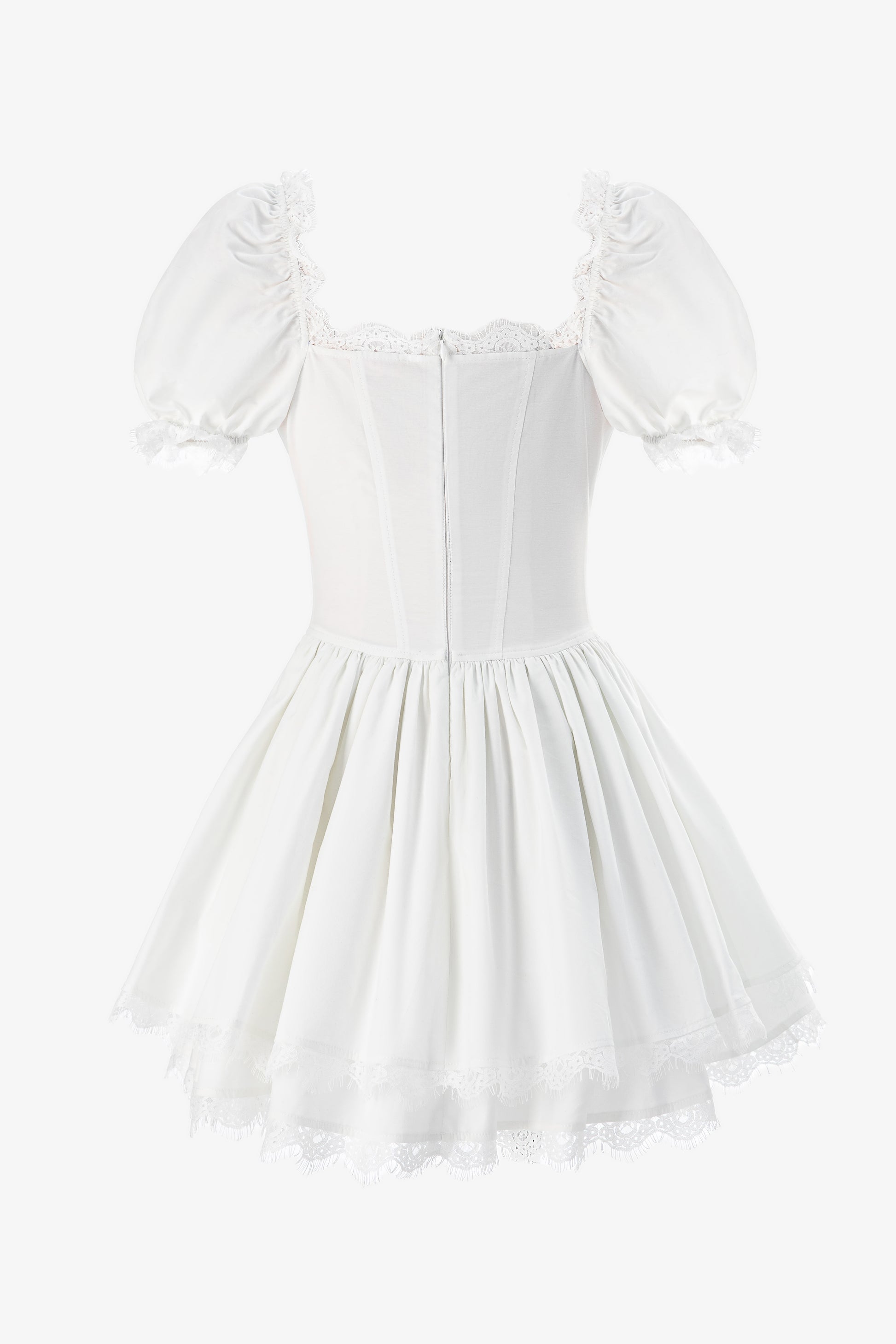 Lace trimmed white corset mini dress close up